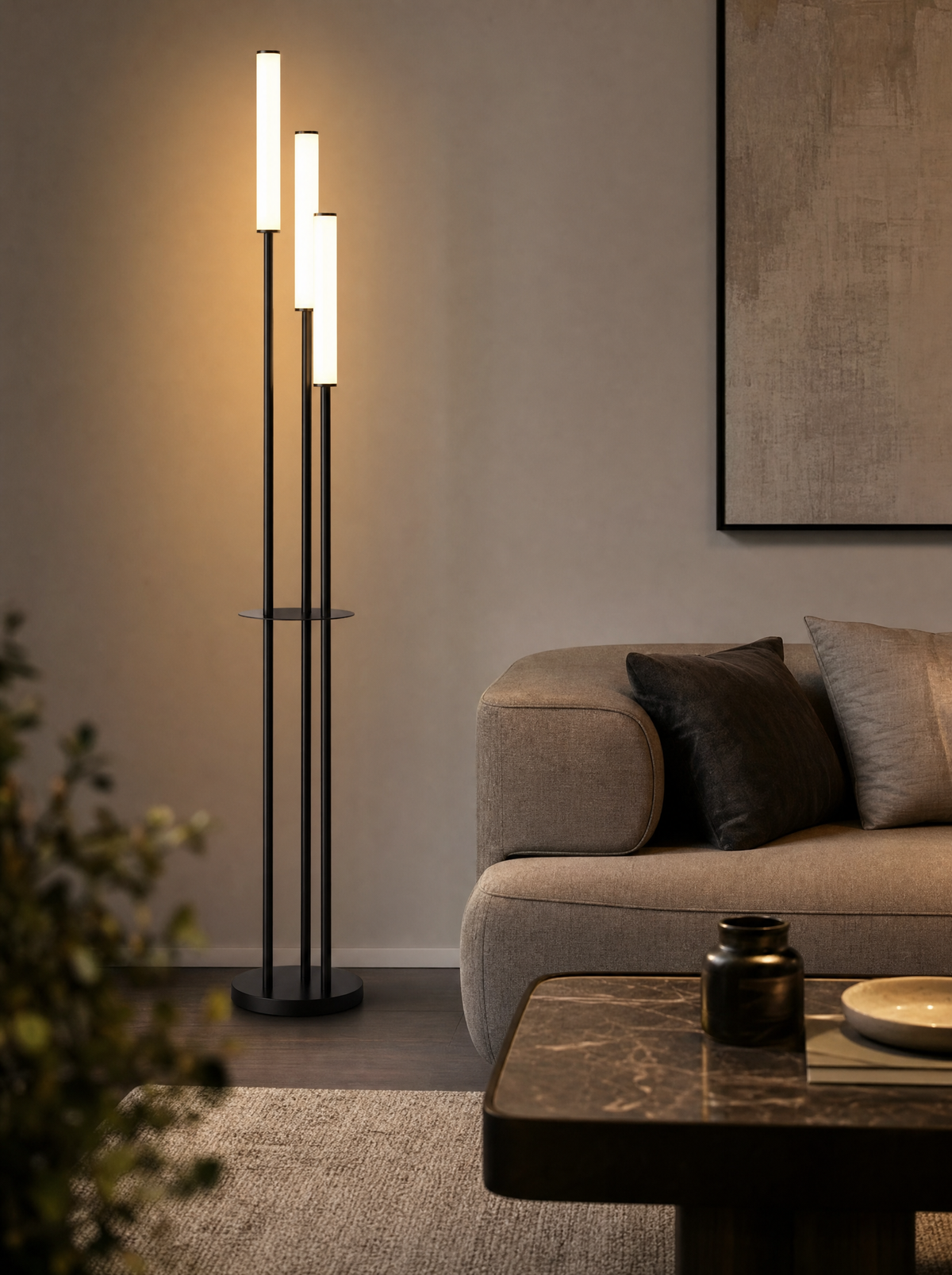 Trio three-head floor lamp with storage shelf glowing beside a sofa