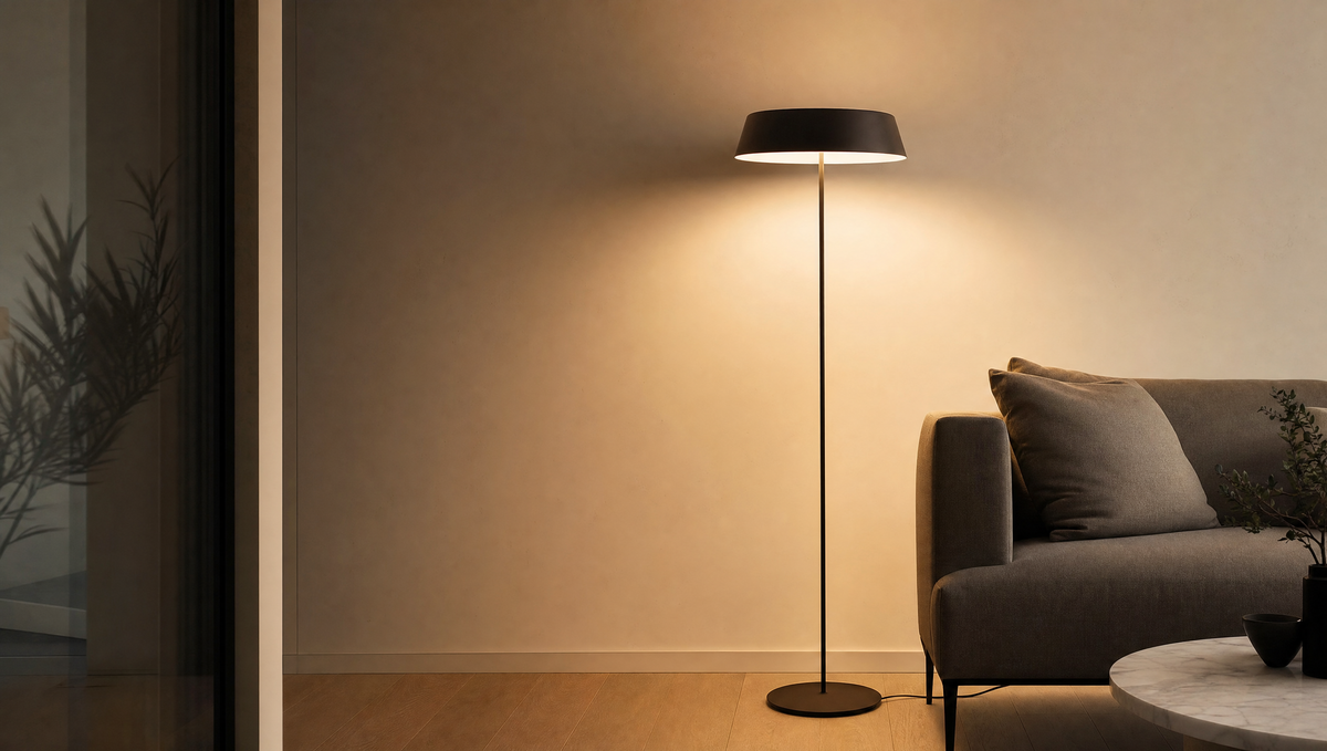 Minimalist floor lamp glowing in a modern living room